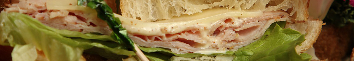 Eating Deli Sandwich at Walter's Deli restaurant in Nantucket, MA.
